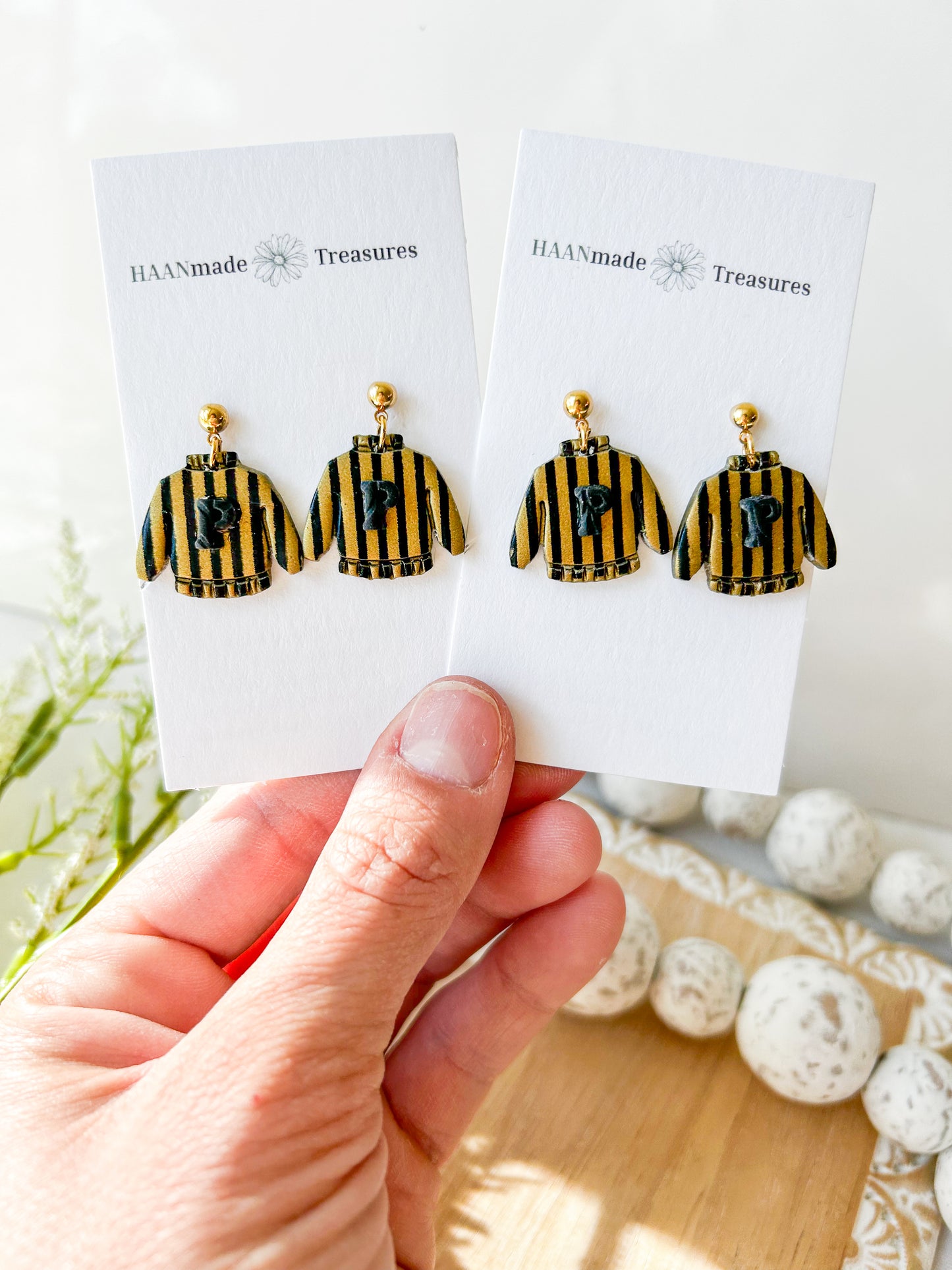 Candy Striped Black & Gold Sweaters