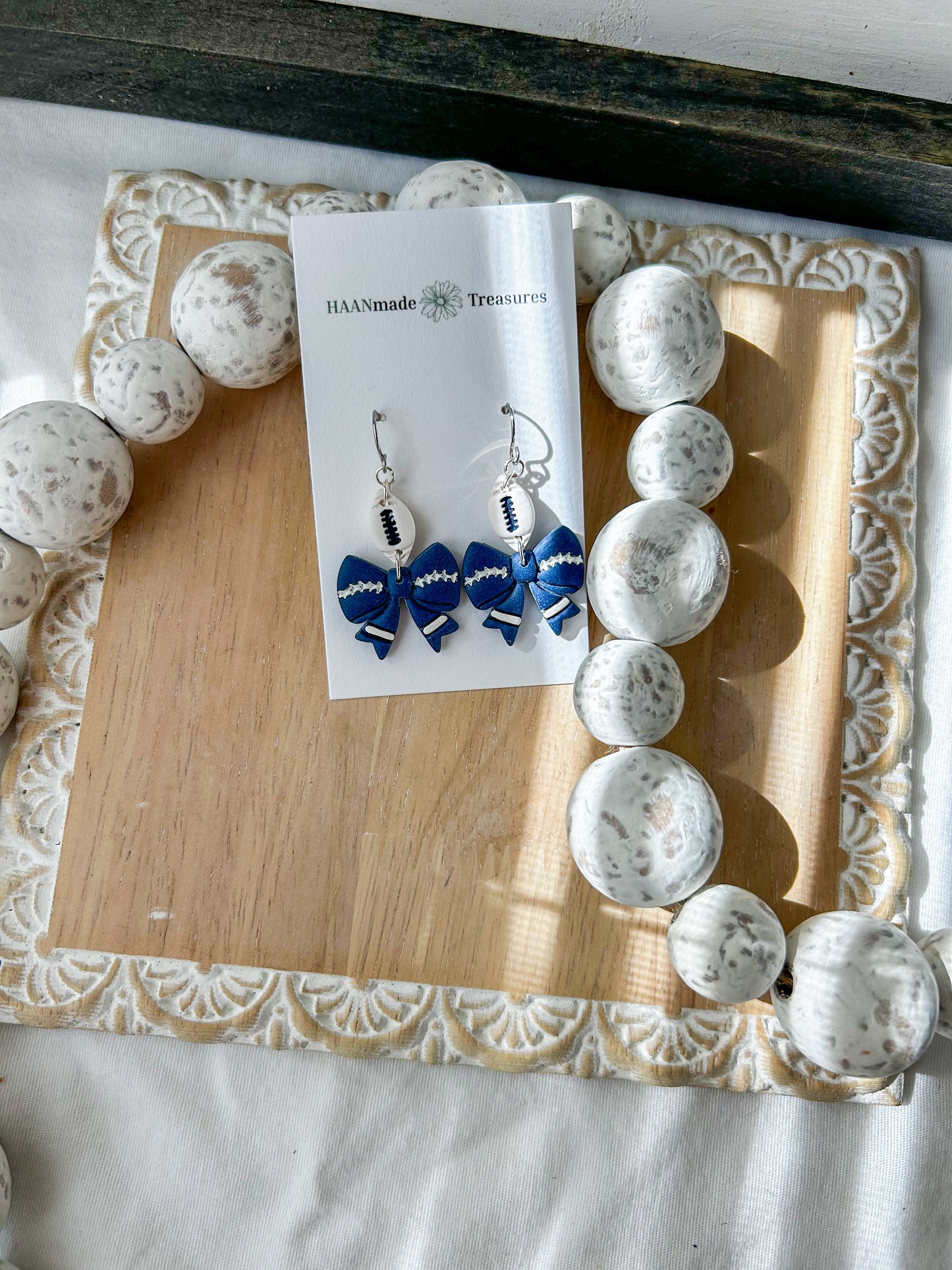 Blue and White Football Bows