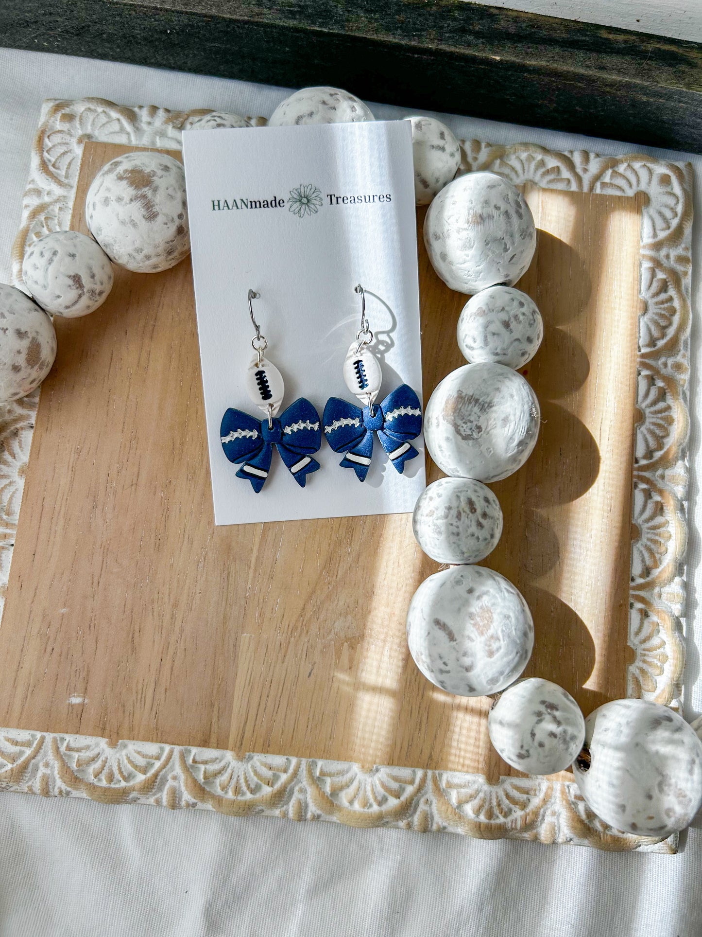 Blue and White Football Bows